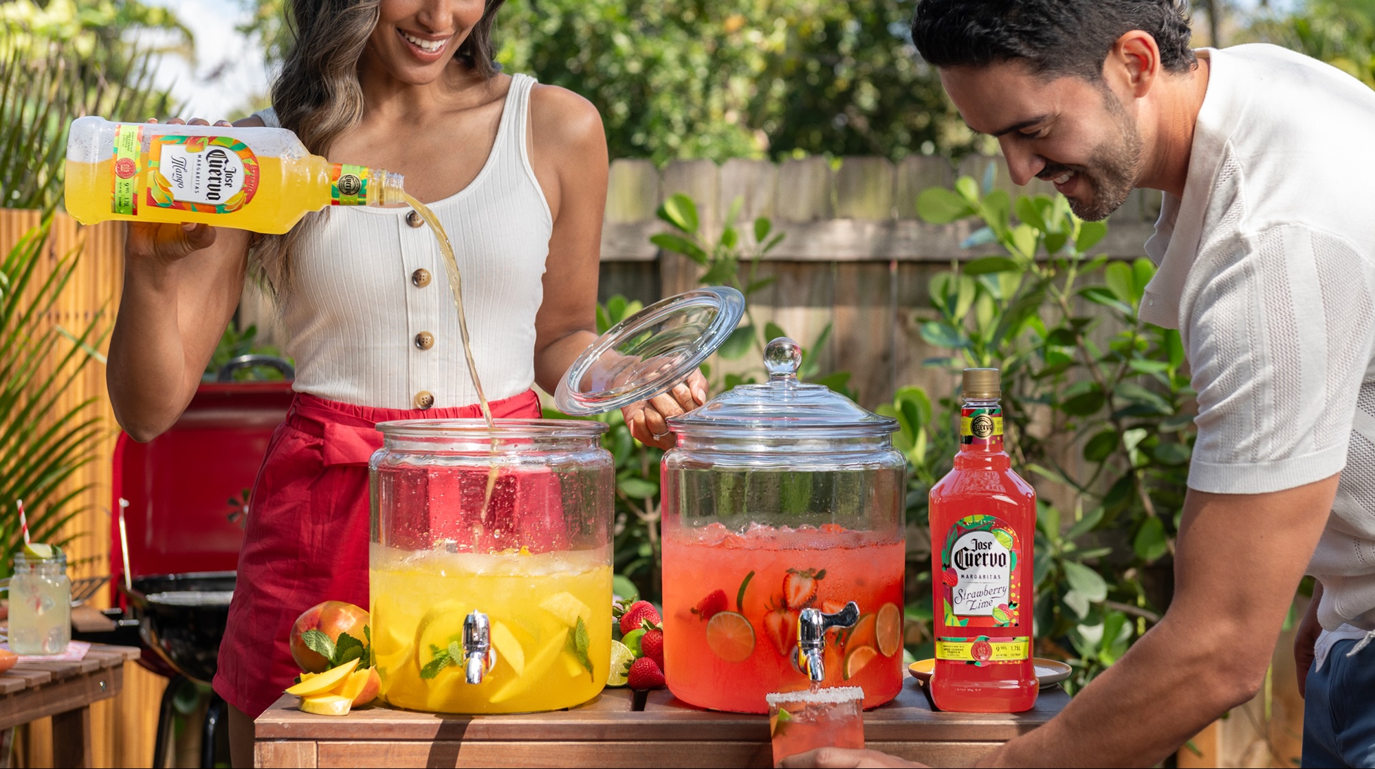 A bottled Cuervo margarita poured over fresh ice with a salt rim and lime wedge